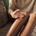 Radiant Bath + Body Oil on legs - Province Apothecary